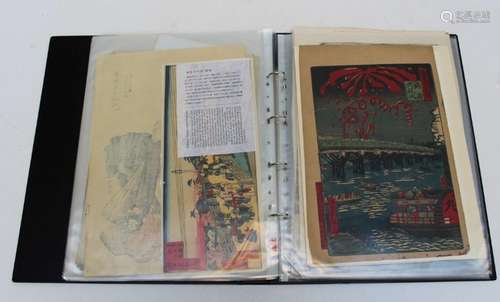 A folio of unframed works on paper, including Japanese woodb...