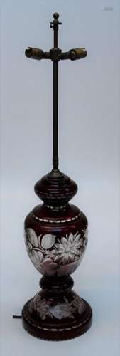 An early 20th century Bohemian ruby flash glass table lamp o...