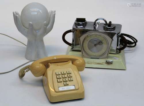 A circa 1980s butter coloured plastic push digit telephone t...