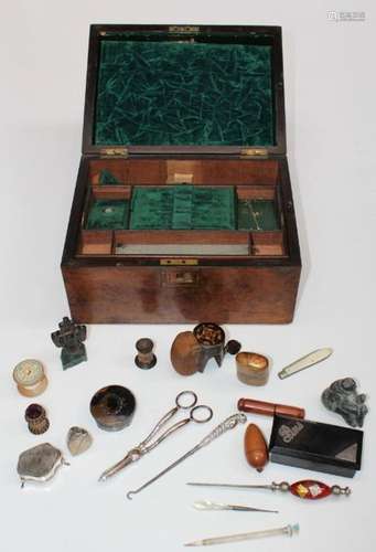 A Victorian walnut needlework/jewellery box containing vario...