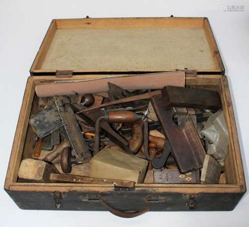 A small quantity of carpentry tools in a painted wooden case...