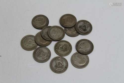 Thirteen One shilling Coins, George V and VI, dates 1927/28/...