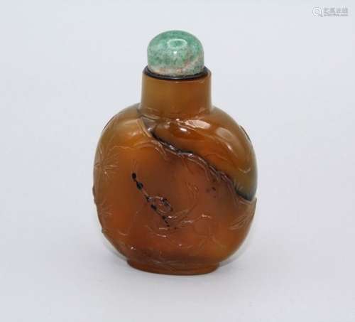 Snuff Bottle. Chalcedony of rounded rectangular form on a ra...