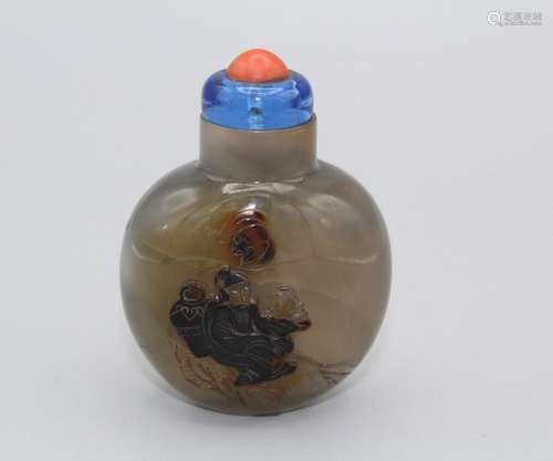 Snuff Bottle. Chalcedony of compressed ovoid shape on a smal...