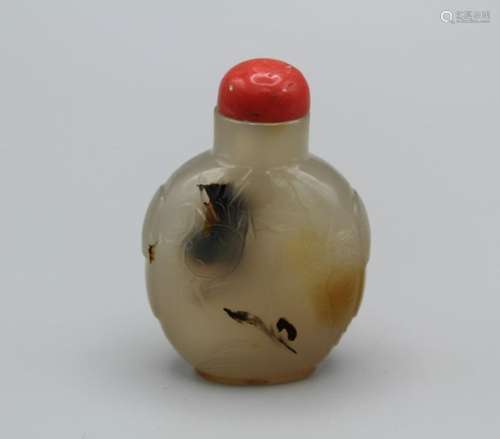 Snuff Bottle. Chalcedony of rounded rectangular form on a ra...