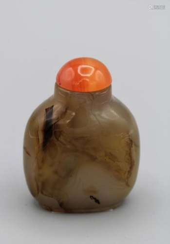 Snuff Bottle. Chalcedony of rounded rectangular form on a br...