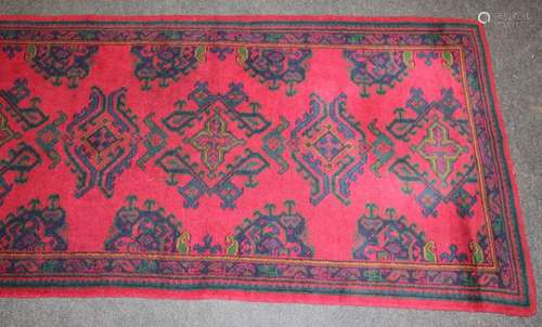 A mid 20th century Turkish Ushak rug woven with latch hook l...