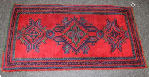 A mid 20th century Turkish Ushak rug, woven with latch hook ...