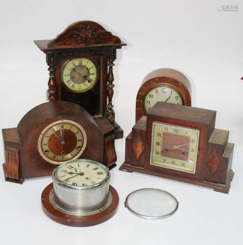 Five various clocks comprising a Smiths ship clock, an oak c...