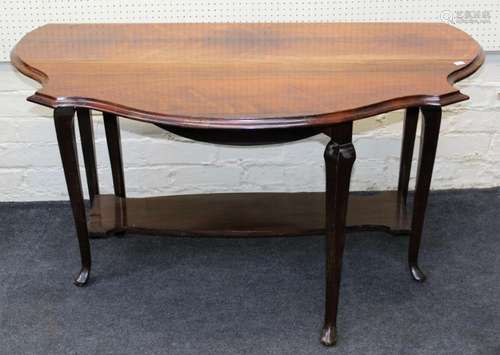 An Edwardian rosewood Pembroke table, the shaped re-entrant ...