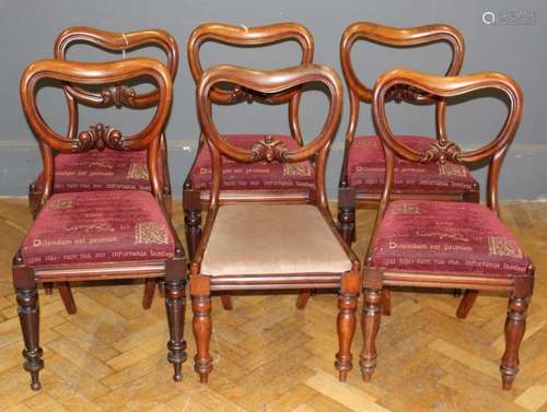 A set of six mid Victorian mahogany balloon back chairs rais...