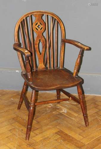 A 19th century beech and elm wheel and stick back Windsor ar...