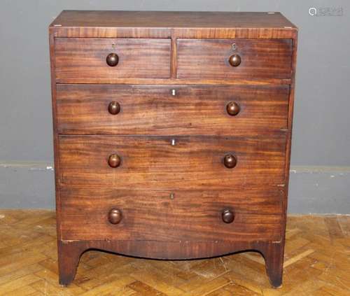 An early 19th century mahogany chest, the rectangular top ov...