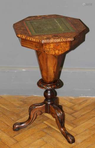 A Victorian walnut trumpet form work table, the floral marqu...