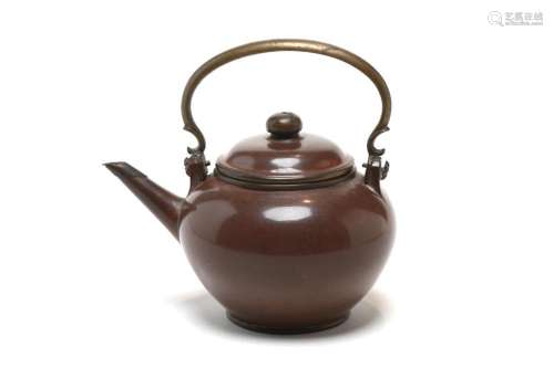 A pottery teapot