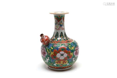 A polychrome porcelain kendi painted with blooming peonies o...