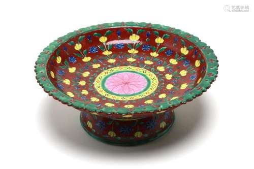 A large Benjarong stem dish painted with a continuous scroll...