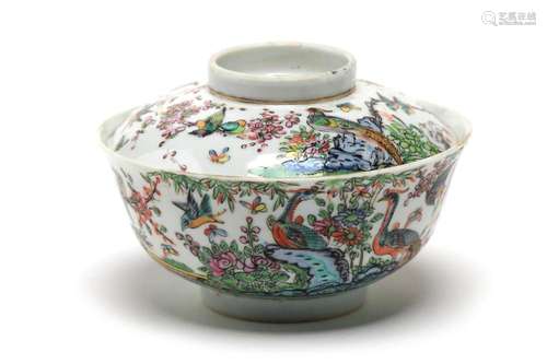 A polychrome porcelain covered bowl painted with phoenixes a...