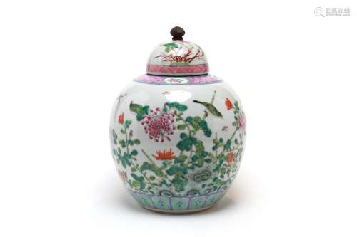 A polychrome porcelain tea caddy with cover painted with bir...
