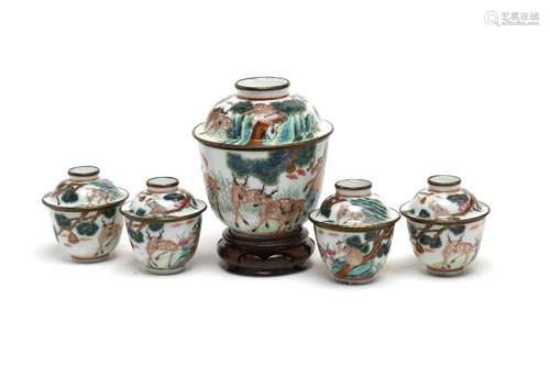 A polychrome porcelain Jibo tea set, each painted with deer,...