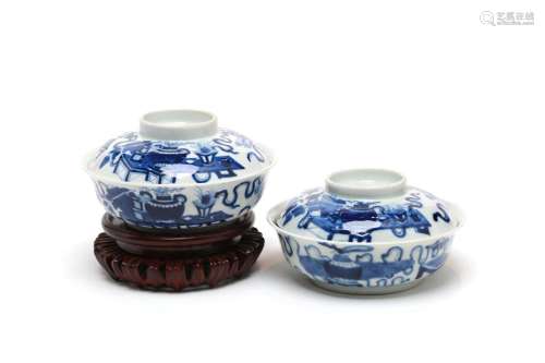 A pair of blue and white porcelain covered bowls, each paint...