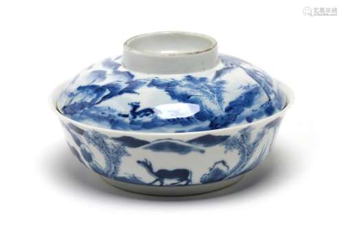 A blue and white porcelain covered bowl painted with deer, h...