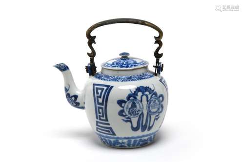 A rare and fine blue and white porcelain teapot painted with...