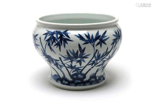 A blue and white porcelain spittoon painted with bamboo bran...