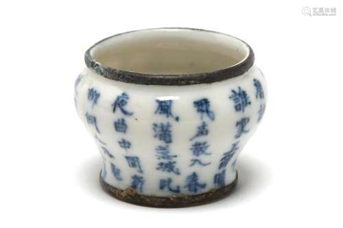 A miniature of blue and white porcelain spittoon painted wit...