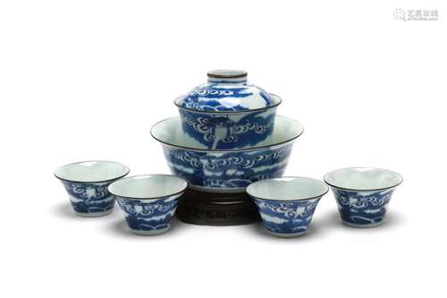 A blue and white porcelain tea set painted with water spouti...