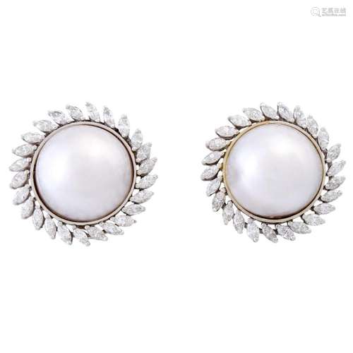 Ear clips with mabe pearls framed by navette diamonds,