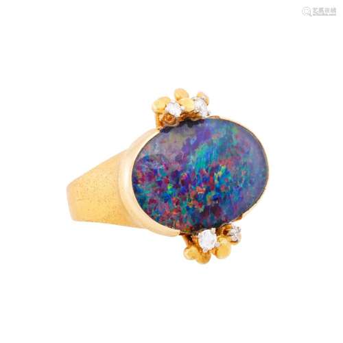 Ring with oval opal triplet and 4 diamonds total ca. 0,18 ct...