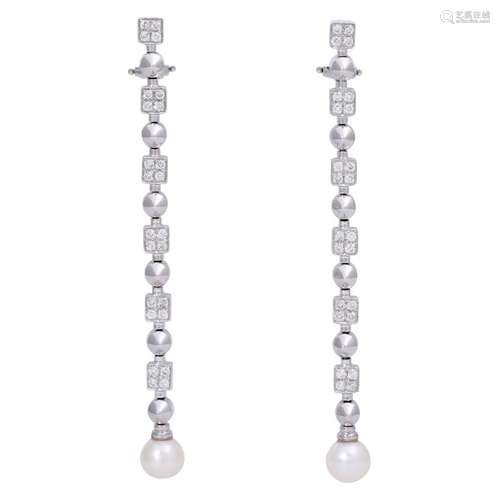 Earrings with pearls and diamonds together ca. 0,9 ct,