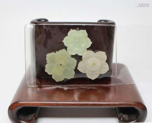 Three Exceptional Antique Carved Hetian Jade Lotus Buttons, ...