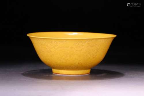 Carved dragon bowl, dark yellow glaze, lover, as the typical...