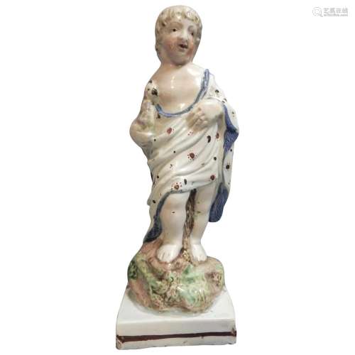 A Small Prattware Figure of a Boy in Roman Dress Holding an ...
