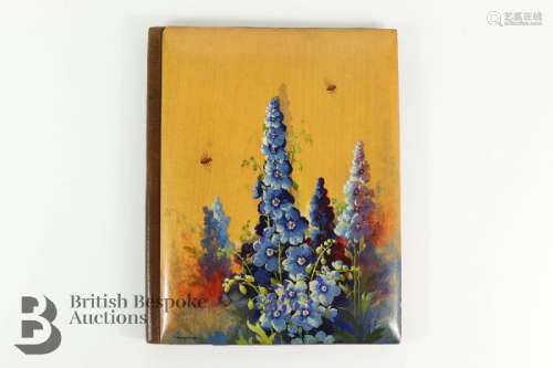 A finely painted cherry wood blotting pad/stationary cover,