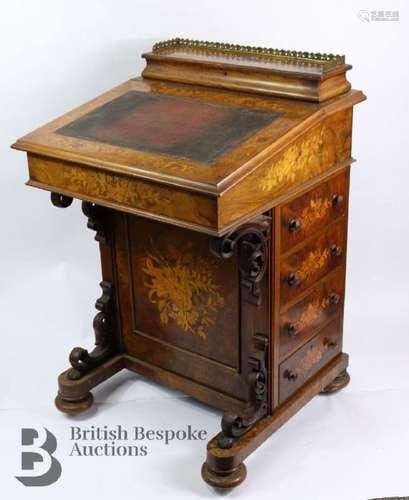 Victorian marquetry davenport, having a small fitted station