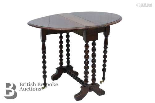 Mahogany drop leaf table, with turned bobbin legs and stretc