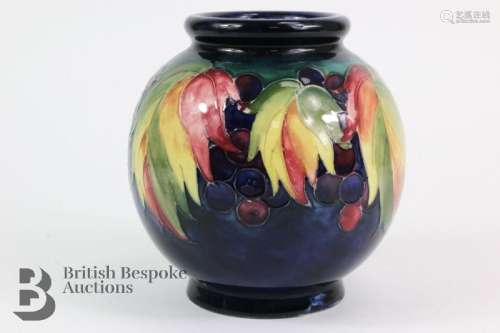 Walter Moorcroft vase, 'Vine and Berry' design, impressed fa