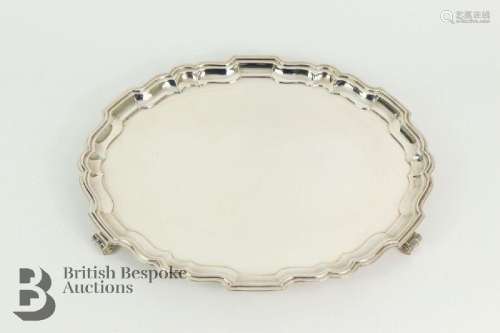 Elizabeth II oval silver tray, pie-crust edge, on scroll fee