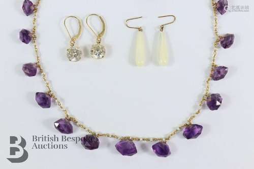 Amethyst and seed pearl necklace. The necklace set with thir