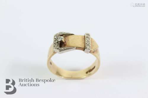 Vintage 9ct gold buckle ring. The ring set with approx 6 pts
