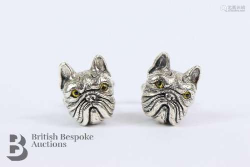 Pair of silver cufflinks, modelled as pug, with emerald coll