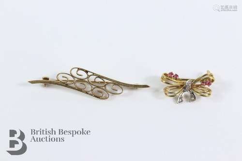 9ct yellow and white gold ruby and diamond bow brooch. The b