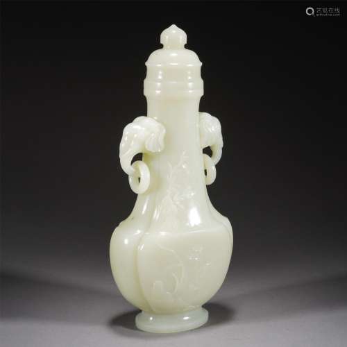 A CHINESE CARVED JADE VASE