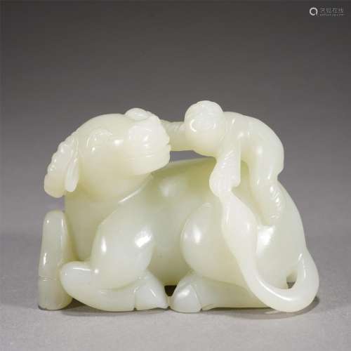 A CHINESE CARVED JADE FIGURE ON BUFFALO