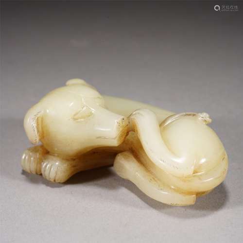 A CHINESE CARVED JADE FIGURE OF DOG