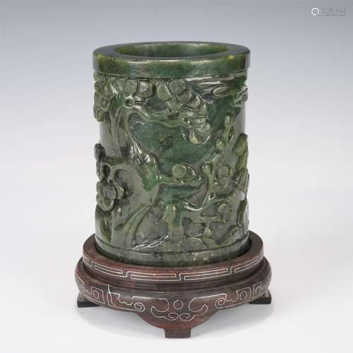 A CHINESE CARVED SPINACH GREEN JADE BRUSH POT