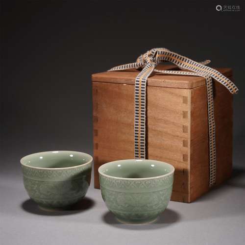 A PAIR OF CELADON GLAZE PORCELAIN CUPS